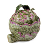 Decorative artichoke-shaped object with green and purple patterns on a white background