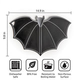 Bat-shaped product with dimensions and safety feature icons on a white background