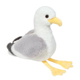 Plush toy seagull on a white background
