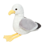 Plush toy seagull on a white background