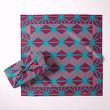 Japanese wrapping cloth in geometric patterns of pinks and aqua