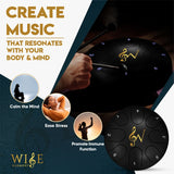 Black tongue drum with hand holding a beater, promotional text, and icons for mental health benefits on a dark blue and white background.
