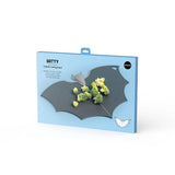 Bat-shaped cutting board with broccoli in packaging on a white background