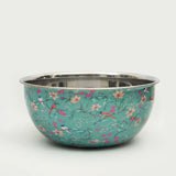 Stainless steel mixing bowl with floral pattern on a white background