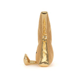 Gold lightning bolt-shaped figurine with a smiling face on a white background