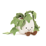 Plush toy shaped like a white flowerpot with green ivy leaves on a white background