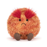 Plush toy resembling a planet with red eyebrows on a white background