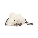 White plush cloud toy with a black strap on a white background