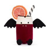 A plush toy shaped like a vampire drink in a glass, with a deep red body, white rim, black wings, black feet, a striped straw, and an orange slice decoration on a white background.