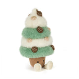 White and green plush tree covered in pinecones. Has a corded tan trunk with a smiling face embroidered on it.