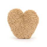 Fluffy beige heart-shaped plush toy on a white background