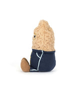 Small plush toy with a beige head and navy body on a white background