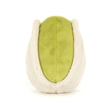 Plush toy shaped like a pistachio with a smiling face on a white background