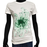 White t-shirt with green floral design on a mannequin