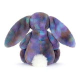 Multicolored plush bunny toy on a white background