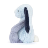 Plush toy rabbit with gray and blue fur on a white background