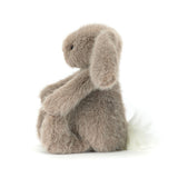 Plush bunny toy with a white background