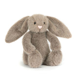 Plush bunny toy with long ears on a white background