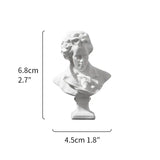 White bust sculpture with dimensions indicated on a white background