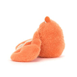 Plush crab toy on a white background