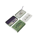 Collection of incense sticks and packaging on a white background
