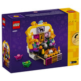 LEGO 40811 building set box, featuring a purple background with a detailed illustration of the assembled Day of the Dead Altar set on the front.