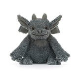A gray plush gargoyle toy with large pointed ears, small horns, and a stitched smiling face, photographed against a clean white background.