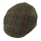 Harris Tweed flat cap in green, red and blue tartan.