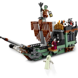 Pirate ship model made of interlocking bricks on a white background