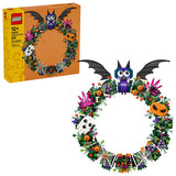 LEGO Halloween wreath set with bat, ghost, and spider design next to its packaging.
