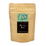 A kraft paper stand-up pouch of Kakawa Chocolate House Havana Rum, featuring a black and mint green label on a white background.