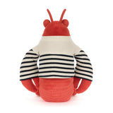 Plush toy lobster with a striped shirt on a white background