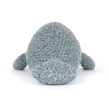 Plush toy Manatee with textured surface on a white background