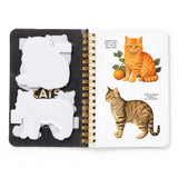 Book with cat-themed stickers and illustrations on a white background