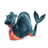 Plush dragon toy with teal body and red belly on a white background