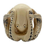 Octopus netsuke, or Japanese toggle figurine on a white background