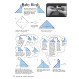 A printed origami instruction sheet titled 'Baby Bird' showing step-by-step folding diagrams, with a small black-and-white photo of hands folding a paper bird in the top right corner.