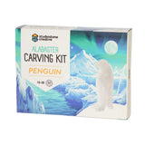Alabaster carving kit packaging with a penguin design on a white background