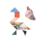 A colorful gemstone tangram puzzle with seven pieces, some in shades of red, orange, yellow, green, blue, and gray, displayed on a white background.