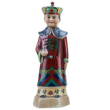 Colorful ceramic figurine of a traditional Chinese official on a white background