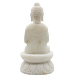 White stone Buddha statue on a white background