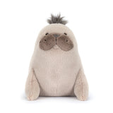 Plush toy sea lion on a white background
