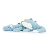 Blue plush dragon toy with colorful accents on a white background