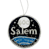 Decorative ornament with 'Salem, Massachusetts' text and star design on a blue background.