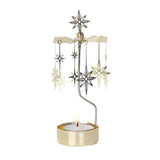 A gold and silver Christmas star mobile candle holder featuring hanging star ornaments on a curved metal stand with a lit tea light candle in a gold holder, isolated on a white background.