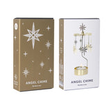 Two product boxes for an Angel Chime 'Northern Star' candle set, shown side-by-side on a plain white background. One box is metallic gold with white star illustrations, and the other is white with a graphic of the gold and silver chime.