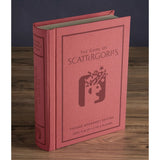 The image shows the Scattergories Vintage Bookshelf Edition board game. The game is packaged in a red box that resembles a vintage book with 'The Game of Scattergories' written on the cover.
