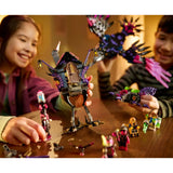 Children playing with LEGO sets on a wooden table