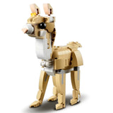 Toy figure of a llama made from interlocking bricks on a white background