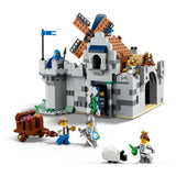 Toy castle set with characters and accessories on a white background